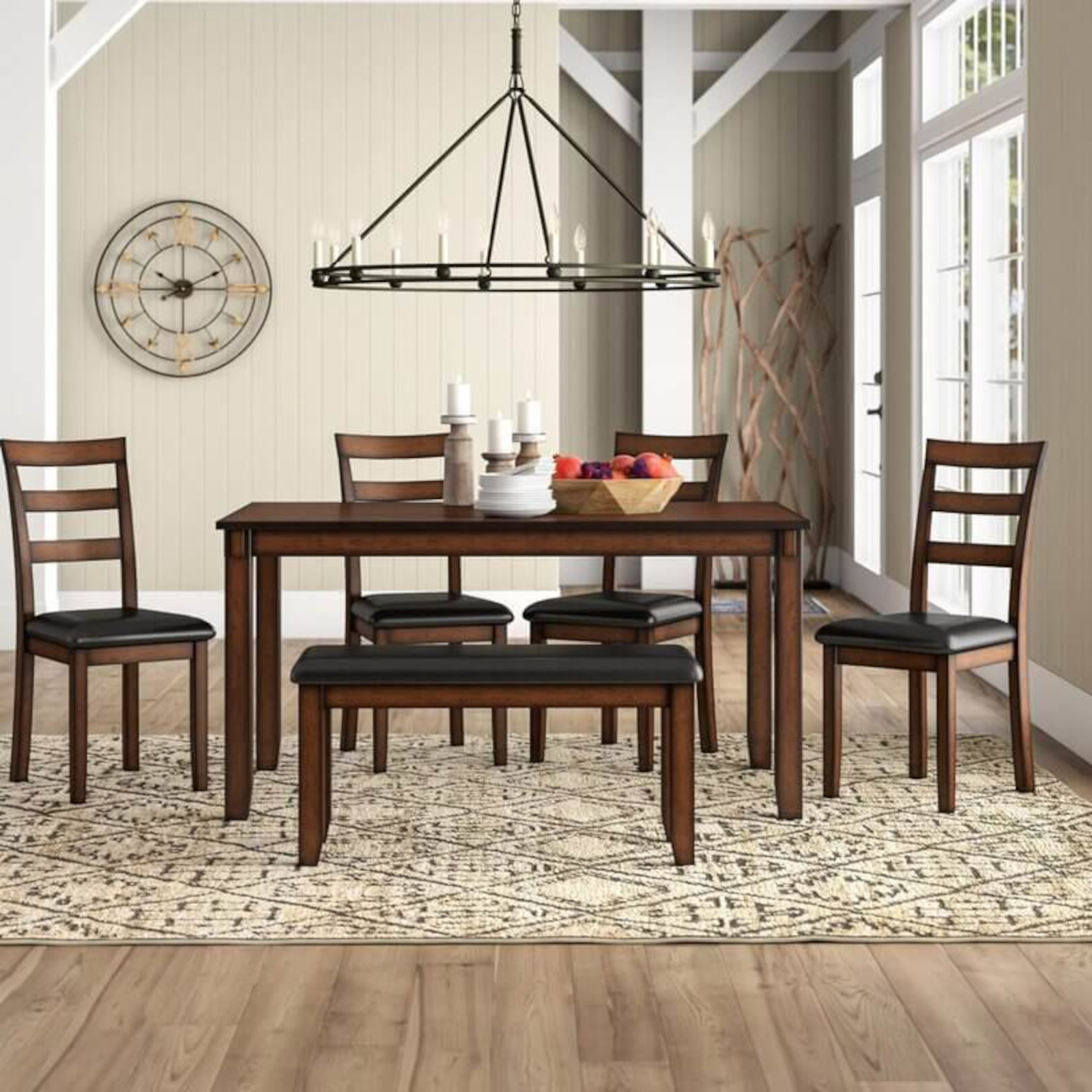Sunlit room with four chairs and a wooden table.